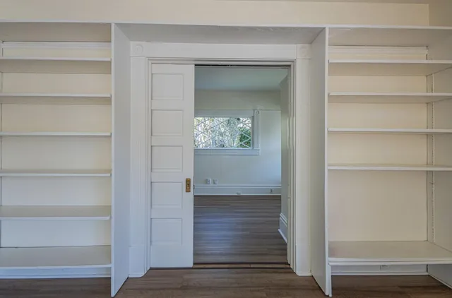 a view of an empty walk in closet