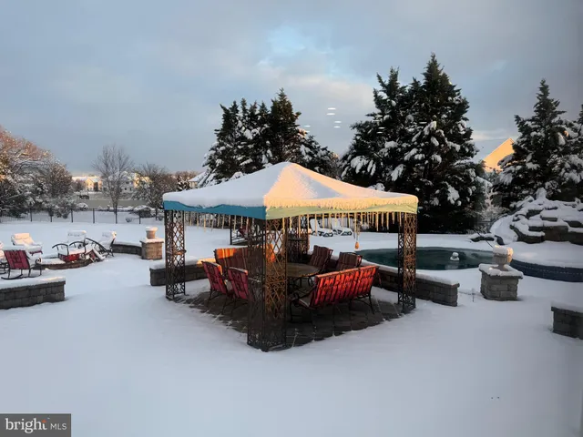 a front view of house with garden