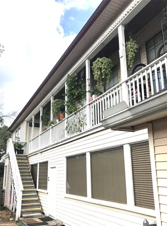 a view of a potted plants on a balcony