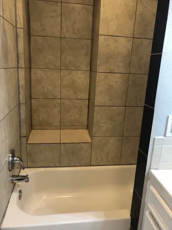 a bathroom with a bathtub