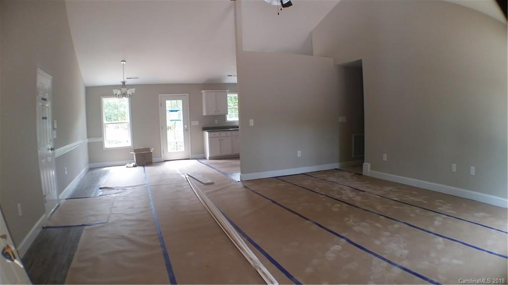 1815 Love Road Monroe, NC 28110 - Photo 5 of 9 a view of an empty room and window