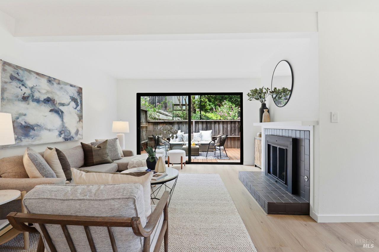 318 Sylvia Way San Rafael, CA 94903 - Photo 3 of 39 Large sliders bring in natural light and open directly to the rear deck...