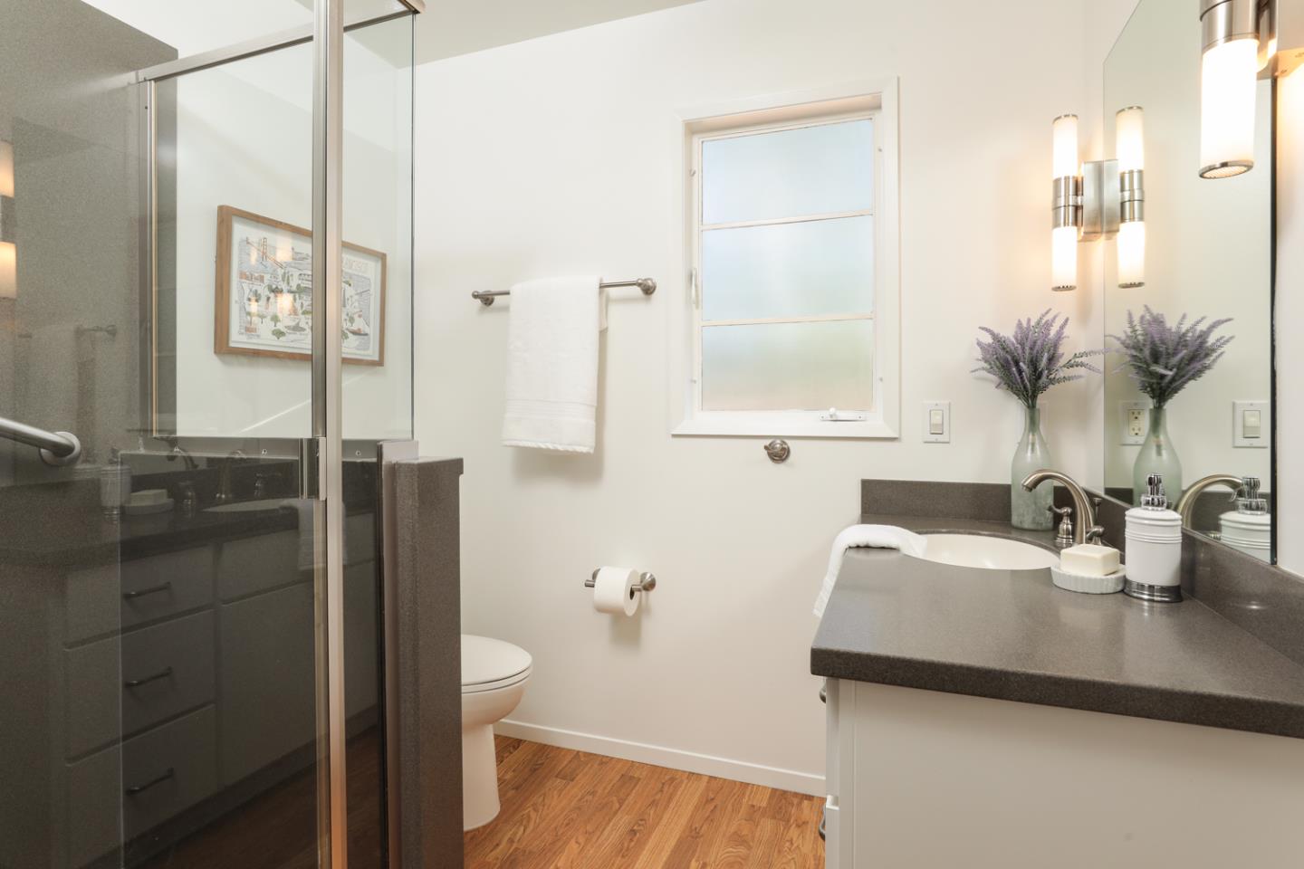 349 Chamisal Avenue Los Altos, CA 94022 - Photo 12 of 27 a bathroom with a double vanity sink toilet and shower