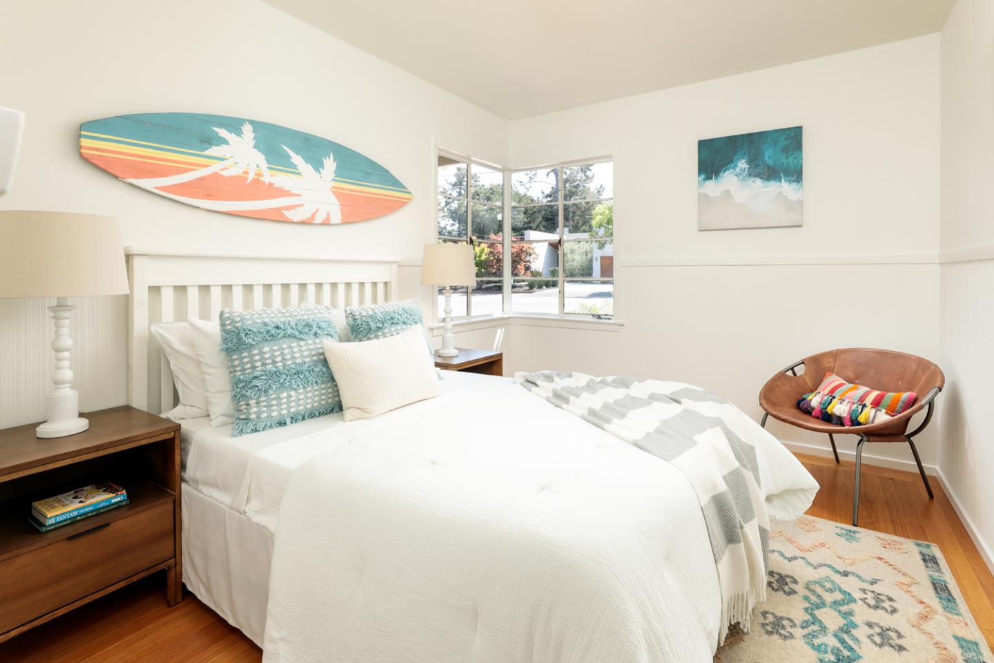 349 Chamisal Avenue Los Altos, CA 94022 - Photo 13 of 27 a bedroom with a bed and a lamp