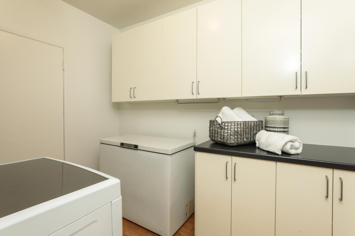 349 Chamisal Avenue Los Altos, CA 94022 - Photo 17 of 27 a kitchen with a sink and cabinets