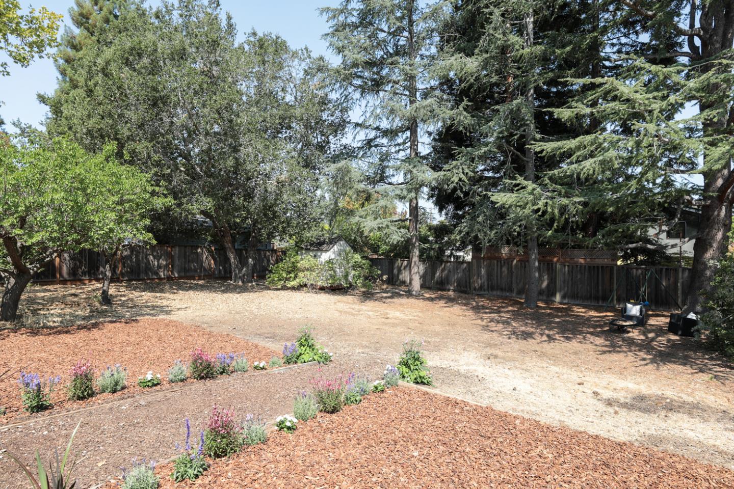 349 Chamisal Avenue Los Altos, CA 94022 - Photo 19 of 27 a view of road with trees