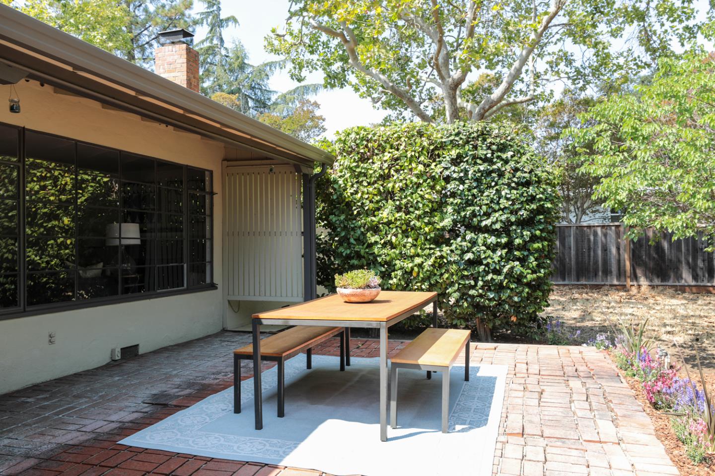 349 Chamisal Avenue Los Altos, CA 94022 - Photo 20 of 27 a backyard of a house with yard and outdoor seating