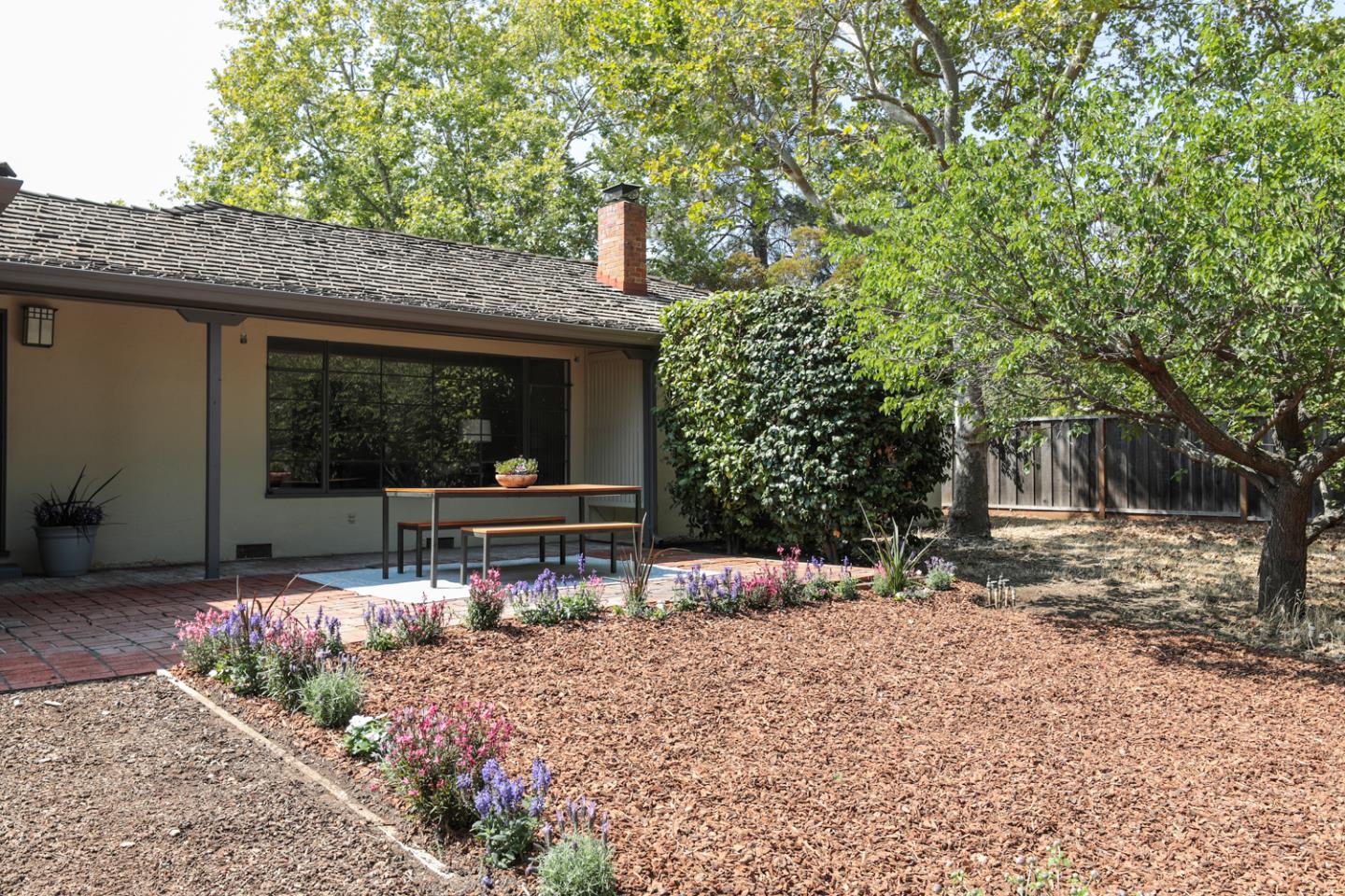 349 Chamisal Avenue Los Altos, CA 94022 - Photo 24 of 27 a front view of a house with garden
