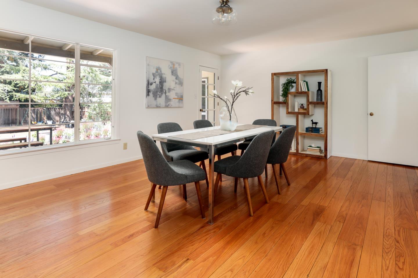 349 Chamisal Avenue Los Altos, CA 94022 - Photo 7 of 27 a view of a dining room with furniture window and wooden floor