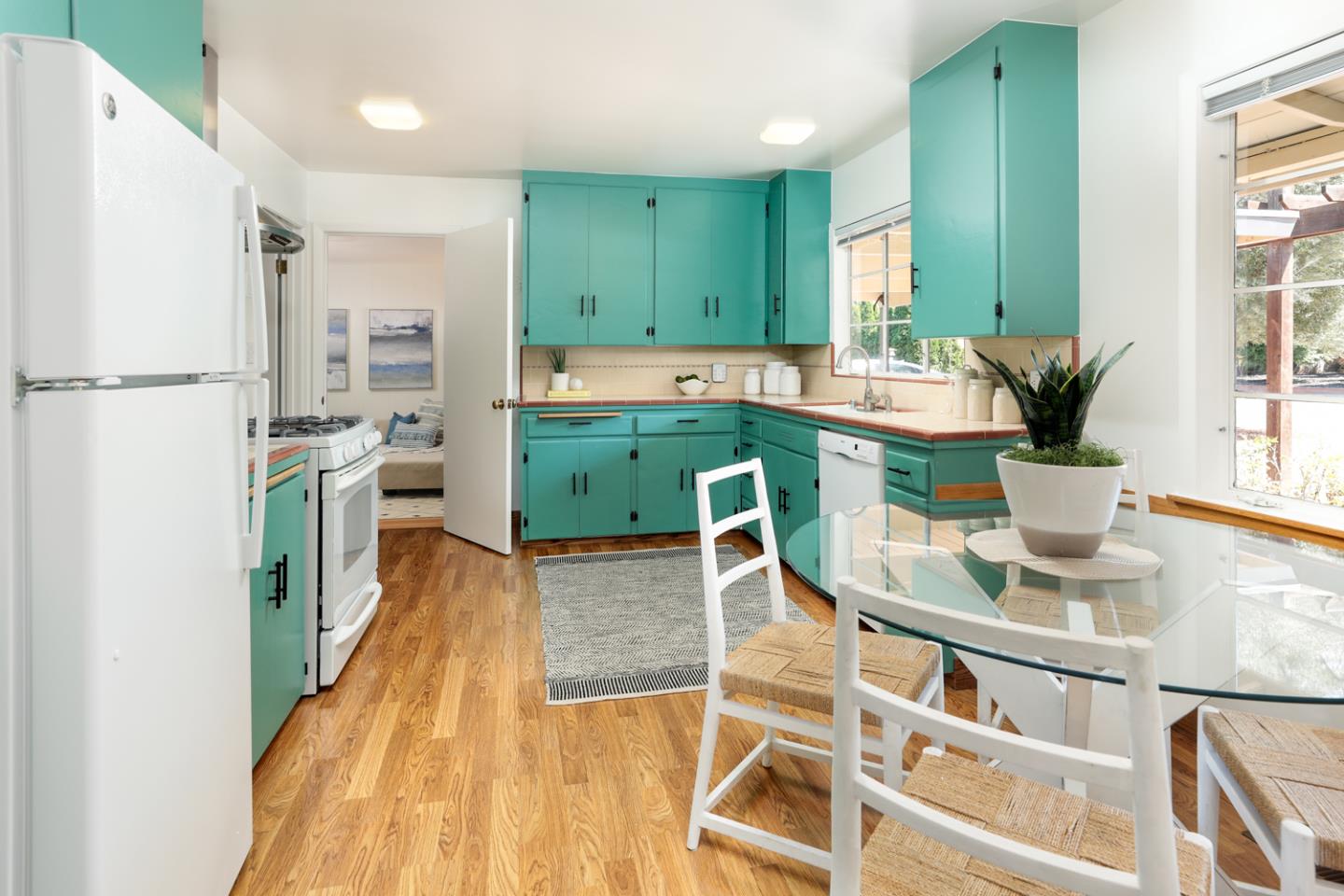 349 Chamisal Avenue Los Altos, CA 94022 - Photo 8 of 27 a kitchen with cabinets a sink and appliances