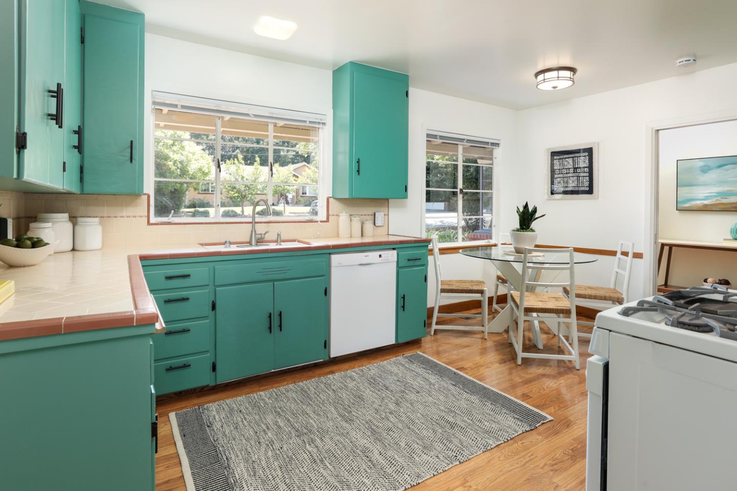 349 Chamisal Avenue Los Altos, CA 94022 - Photo 9 of 27 a living room with furniture window and wooden floor
