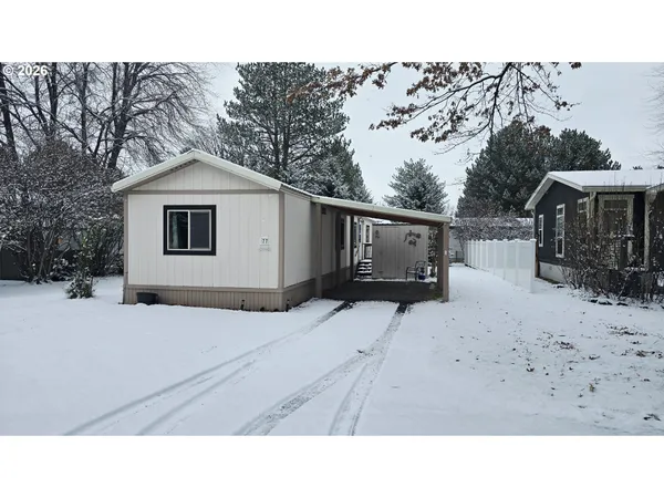 a black and white photo of a house