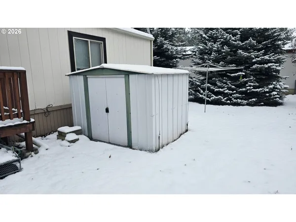 a black and white photo of a house