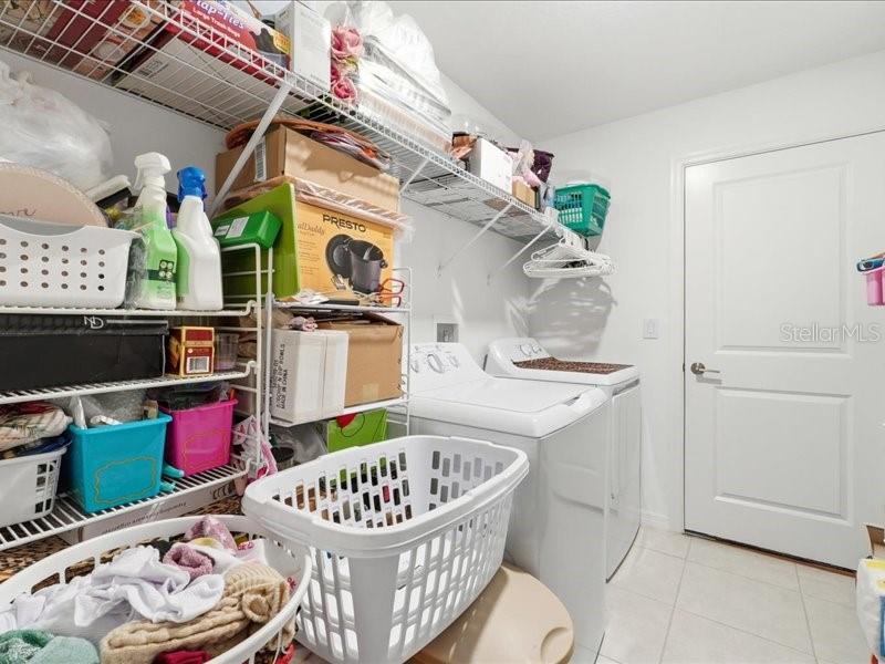 3943 Resting Robin Avenue Bartow, FL 33830 - Photo 23 of 38 a bedroom with a bed and a wooden floor