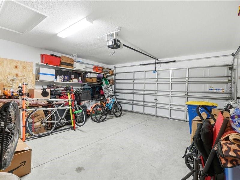 3943 Resting Robin Avenue Bartow, FL 33830 - Photo 24 of 38 a view of a storage area with a bike