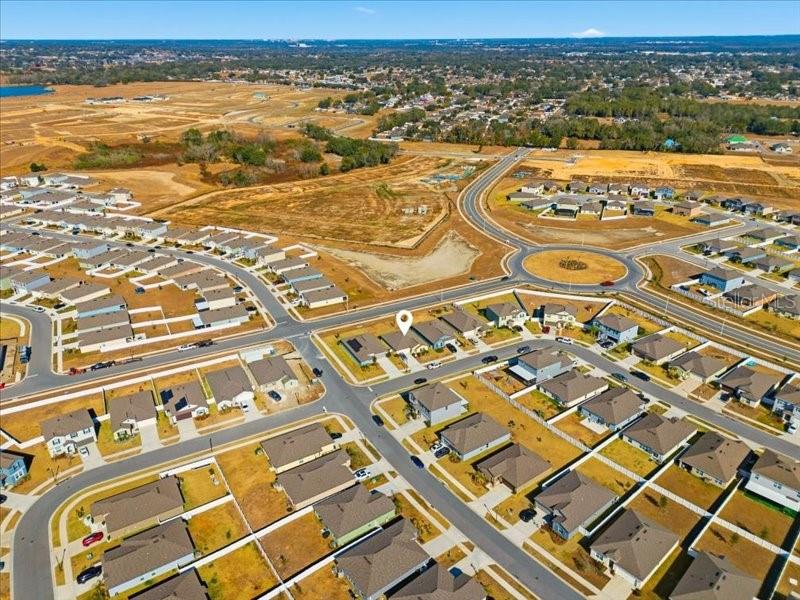 3943 Resting Robin Avenue Bartow, FL 33830 - Photo 33 of 38 an aerial view of residential building and lake view
