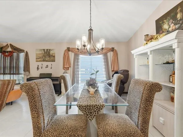 a view of a dining room with furniture