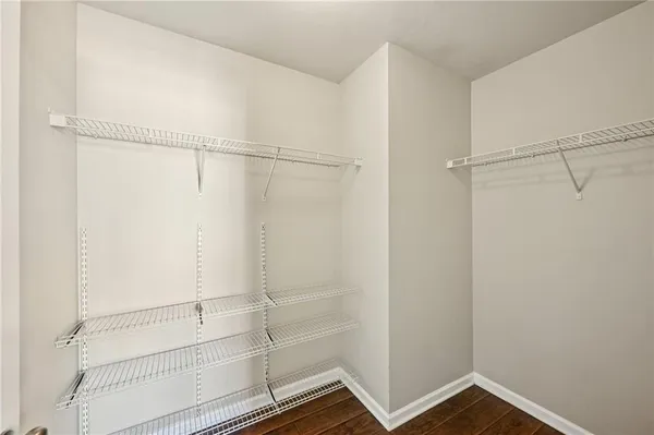 a view of an empty walk in closet
