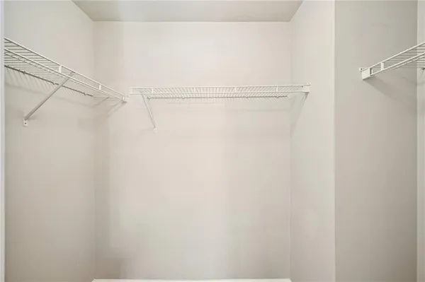 a view of a room with racks on the wall
