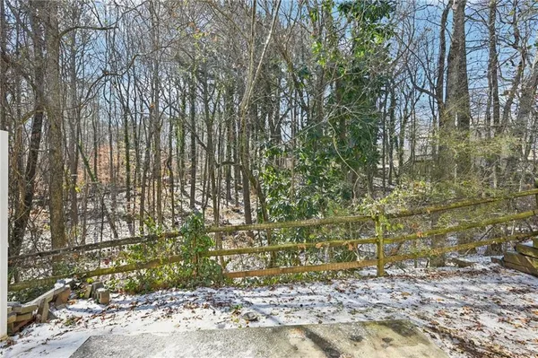 a view of a backyard with green space