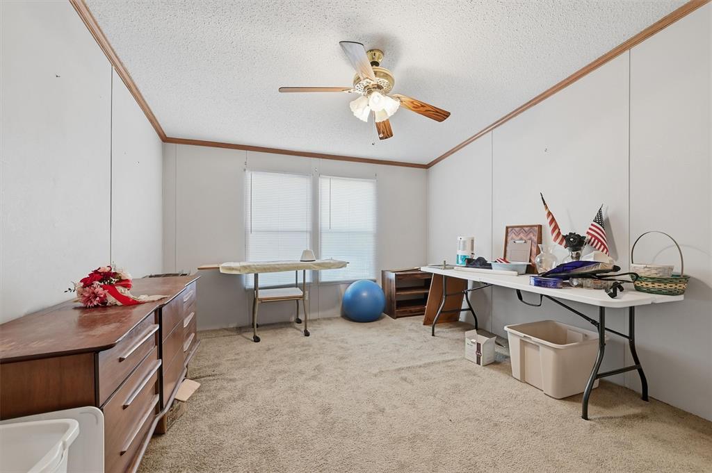 227 Sheryl Lane Denison, TX 75021 - Photo 21 of 37 a view of a workspace with furniture