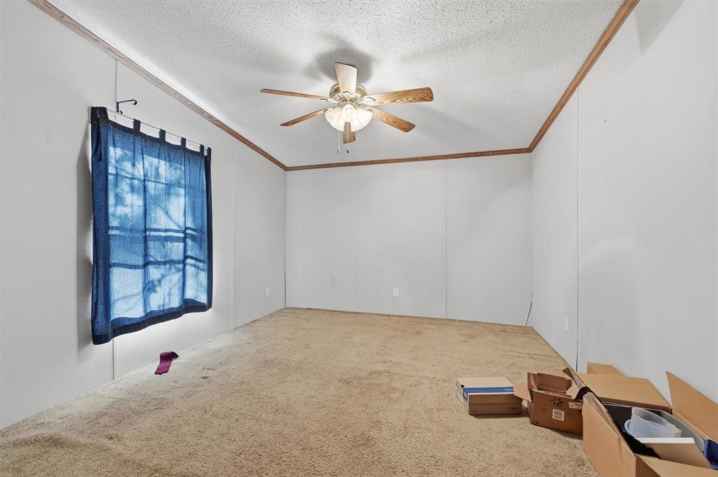 227 Sheryl Lane Denison, TX 75021 - Photo 25 of 37 a view of livingroom with hardwood floor and window