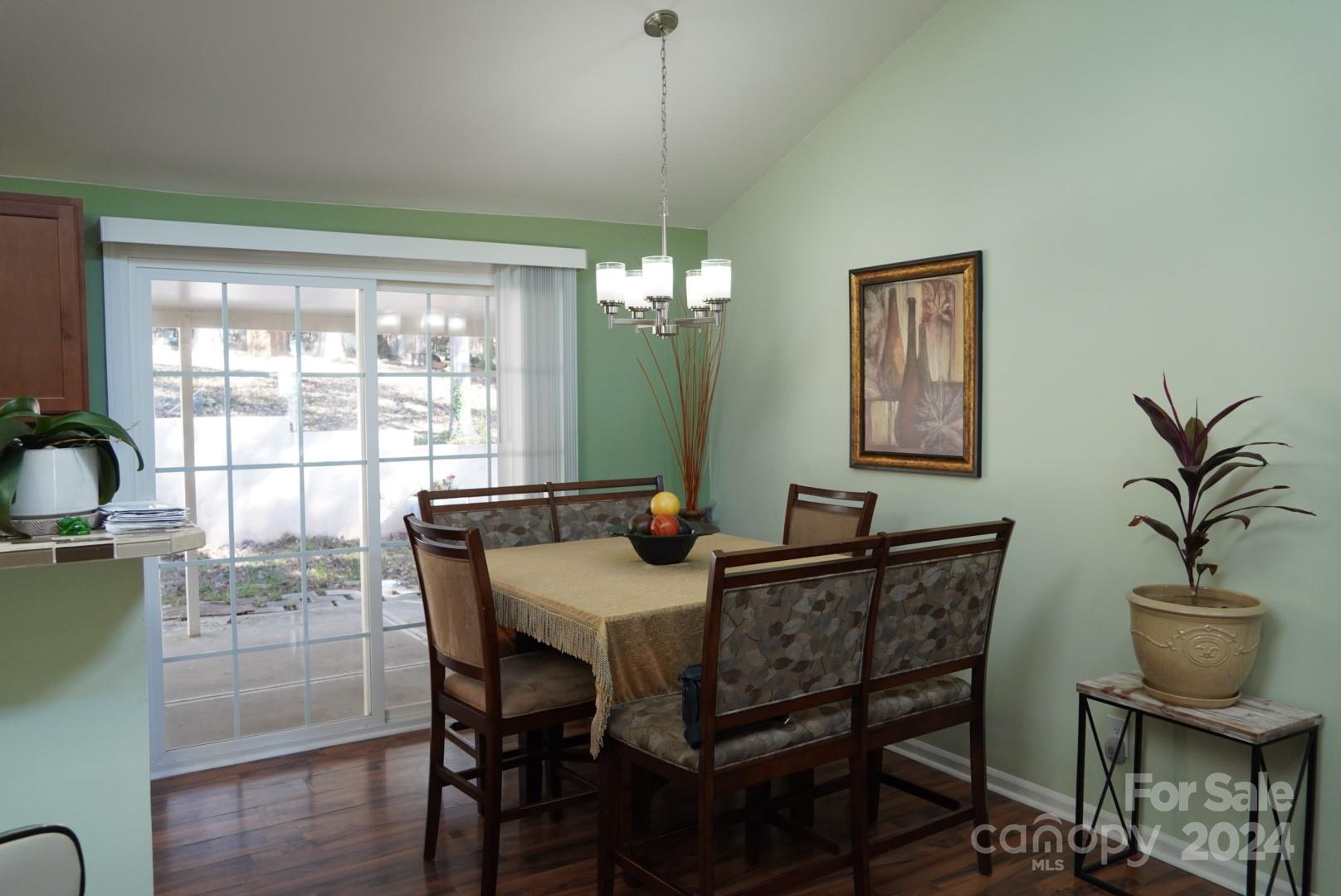 8357 Barncliff Road Charlotte, NC 28227 - Photo 9 of 15 a view of a dining room with furniture window and outside view