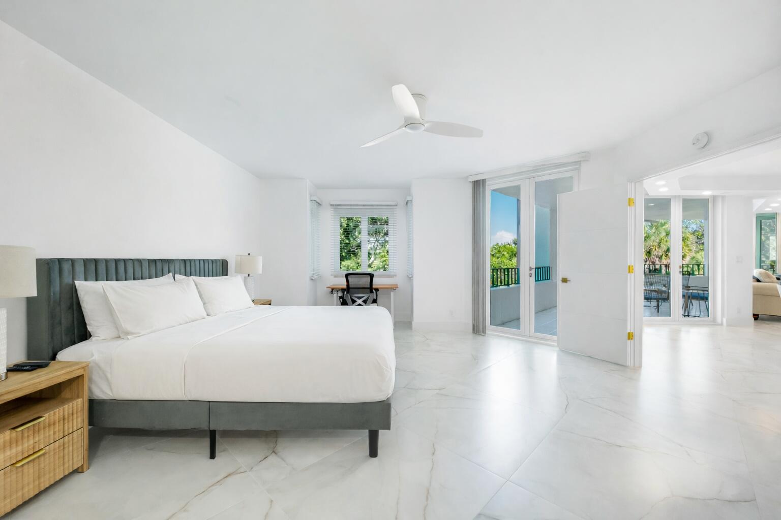 100 Southeast 5th Avenue, Unit 304 Boca Raton, FL 33432 - Photo 9 of 60 Primary bedroom with balcony view (1)