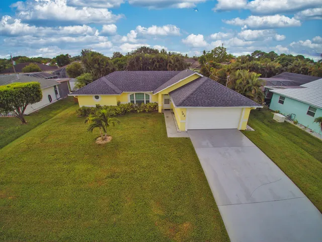 a view of yard with outdoor seating