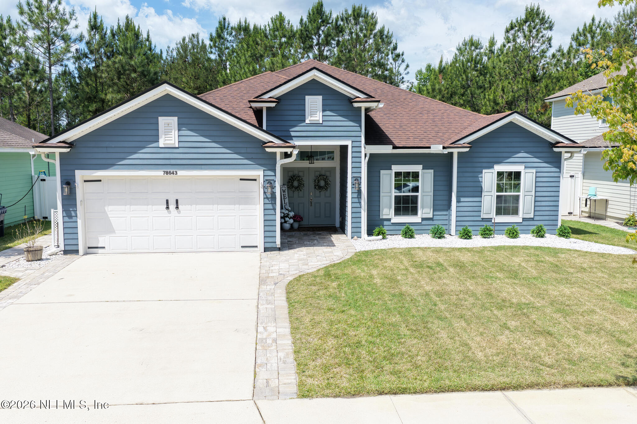 78643 Goldfinch Lane Yulee, FL 32097 - Photo 2 of 60 Front Up