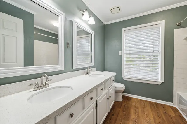 a kitchen with a sink and a counter top space