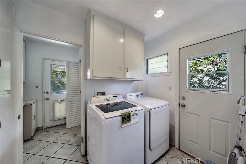 3667 Willowcrest Avenue Studio City, CA 91604 - Photo 13 of 49 a utility room with closet dryer and washer