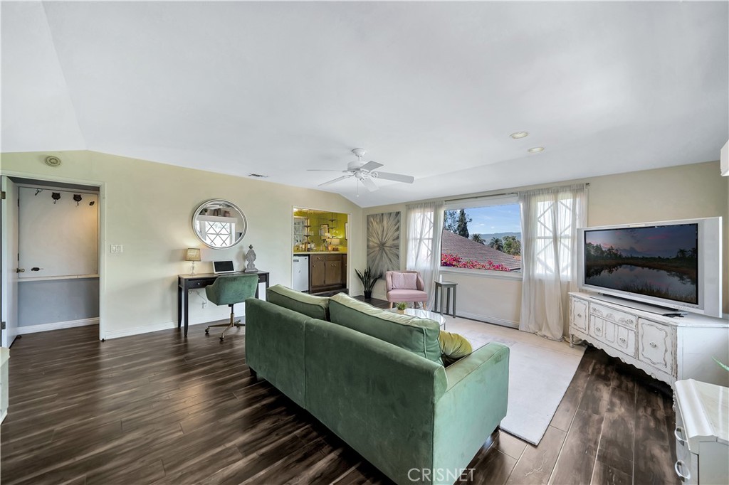 3667 Willowcrest Avenue Studio City, CA 91604 - Photo 16 of 49 a living room with furniture and a flat screen tv