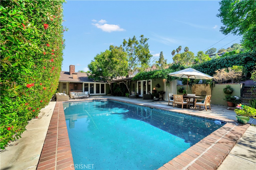 3667 Willowcrest Avenue Studio City, CA 91604 - Photo 27 of 49 a view of a house with backyard porch and sitting area