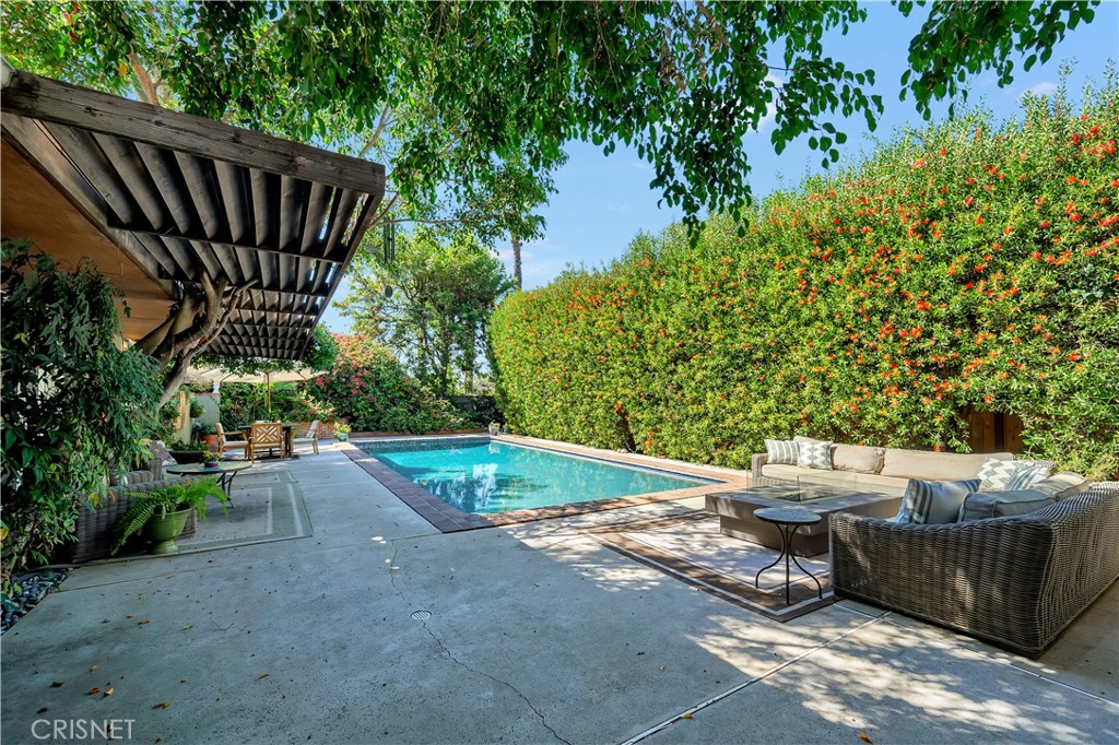 3667 Willowcrest Avenue Studio City, CA 91604 - Photo 31 of 49 a view of a backyard with chairs and flower plants