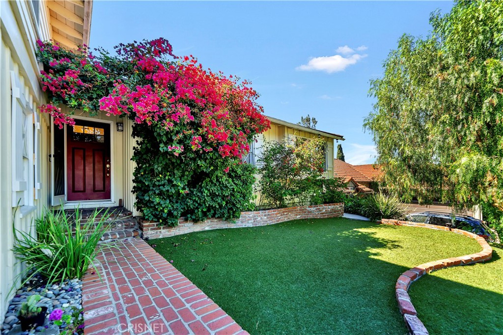 3667 Willowcrest Avenue Studio City, CA 91604 - Photo 4 of 49 a view of a backyard with potted plants