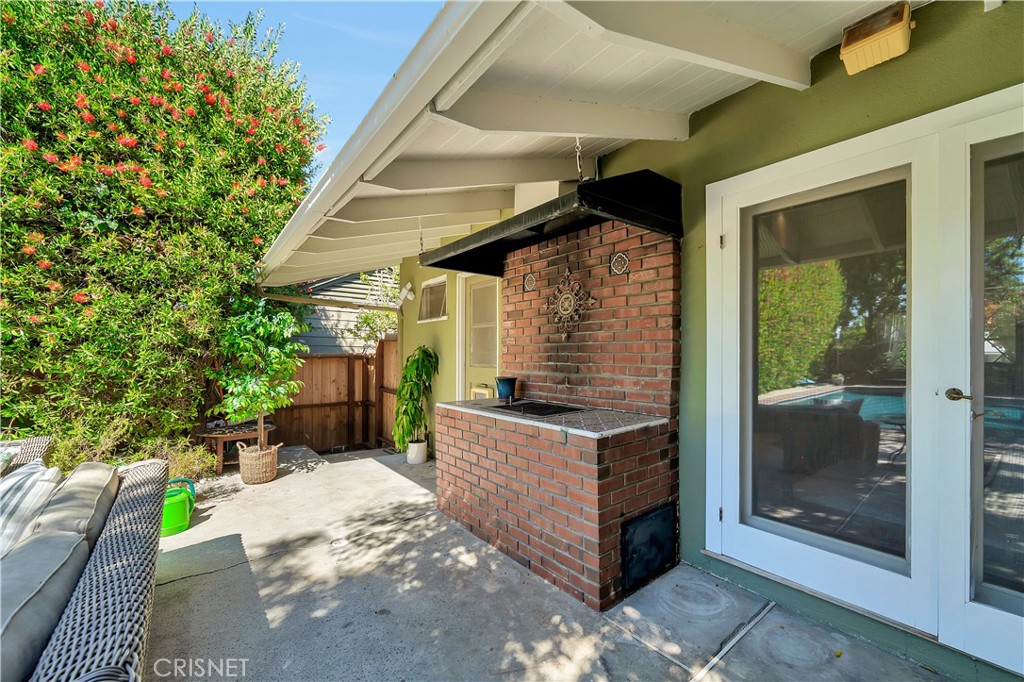 3667 Willowcrest Avenue Studio City, CA 91604 - Photo 46 of 49 a view of backyard with a tub and outdoor seating