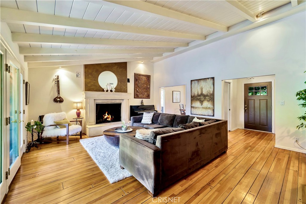 3667 Willowcrest Avenue Studio City, CA 91604 - Photo 5 of 49 a living room with furniture and a fireplace