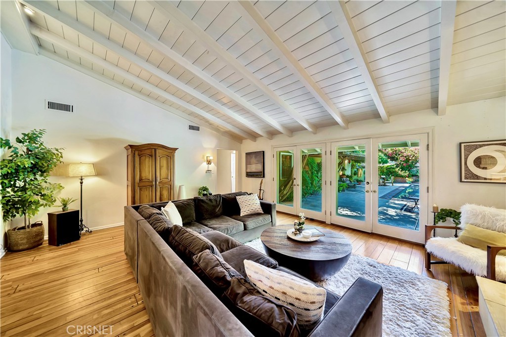 3667 Willowcrest Avenue Studio City, CA 91604 - Photo 7 of 49 a living room with furniture and a large window