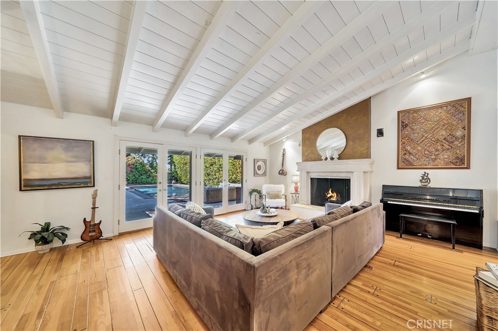 3667 Willowcrest Avenue Studio City, CA 91604 - Photo 8 of 49 a living room with furniture and a fireplace