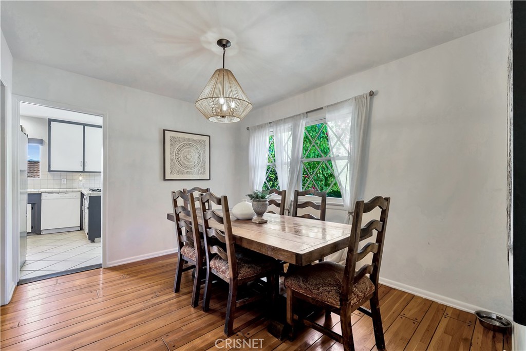 3667 Willowcrest Avenue Studio City, CA 91604 - Photo 9 of 49 a view of a dining room with furniture window and wooden floor
