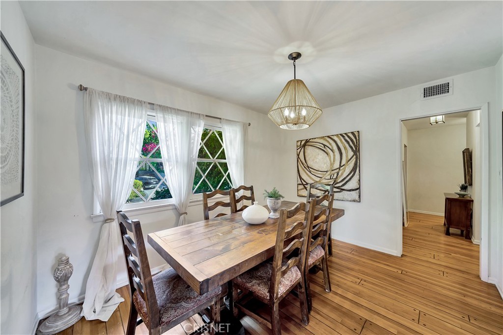 3667 Willowcrest Avenue Studio City, CA 91604 - Photo 10 of 49 a view of a dining room with furniture window and wooden floor