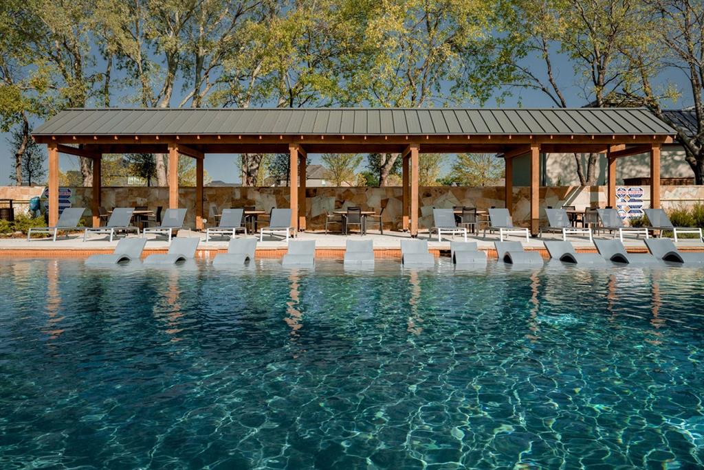 832 Stone Grv Road Lavon, TX 75166 - Photo 18 of 21 a swimming pool with outdoor seating and yard