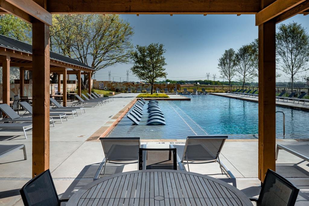 832 Stone Grv Road Lavon, TX 75166 - Photo 20 of 21 a view of swimming pool with seating area