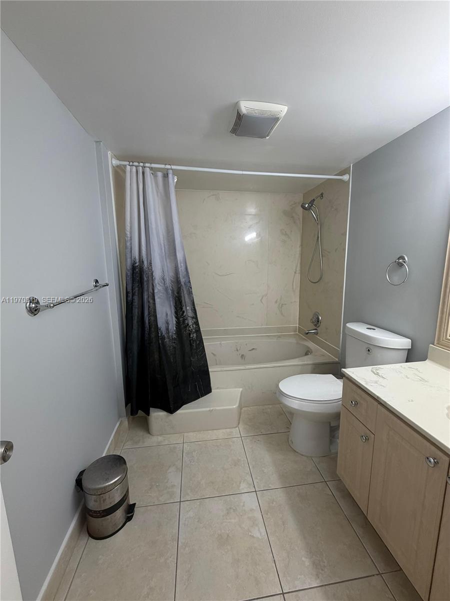 17600 North Bay Road, Unit N907 Sunny Isles Beach, FL 33160 - Photo 20 of 22 a bathroom with a toilet and a shower