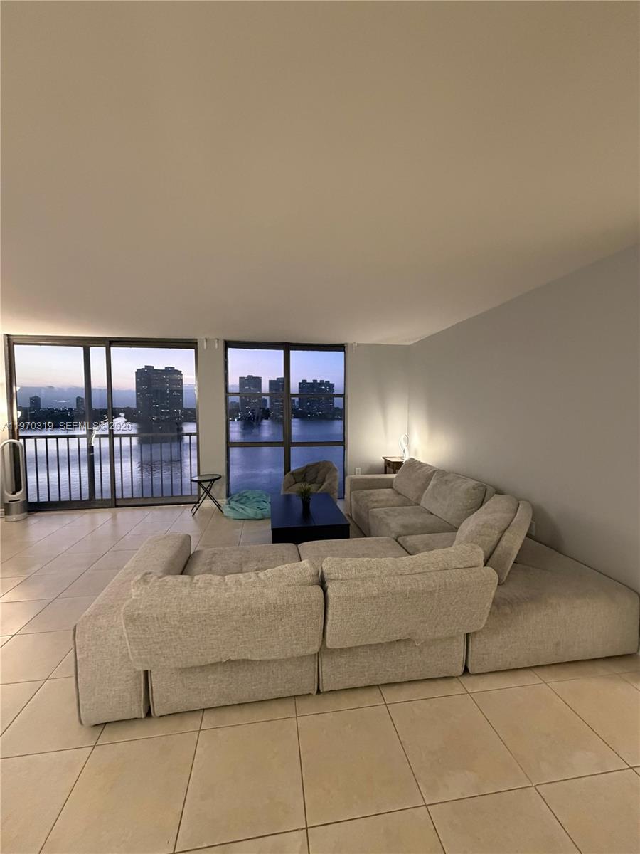 17600 North Bay Road, Unit N907 Sunny Isles Beach, FL 33160 - Photo 3 of 22 a living room with furniture