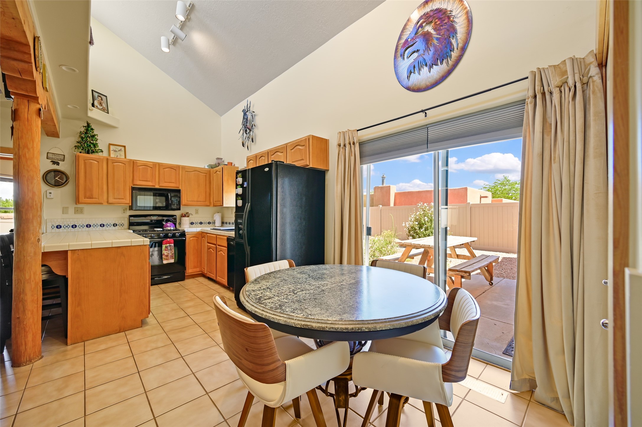 7516 Sagebrush Road Santa Fe, NM 87507 - Photo 4 of 27 Dining and slider to back yard