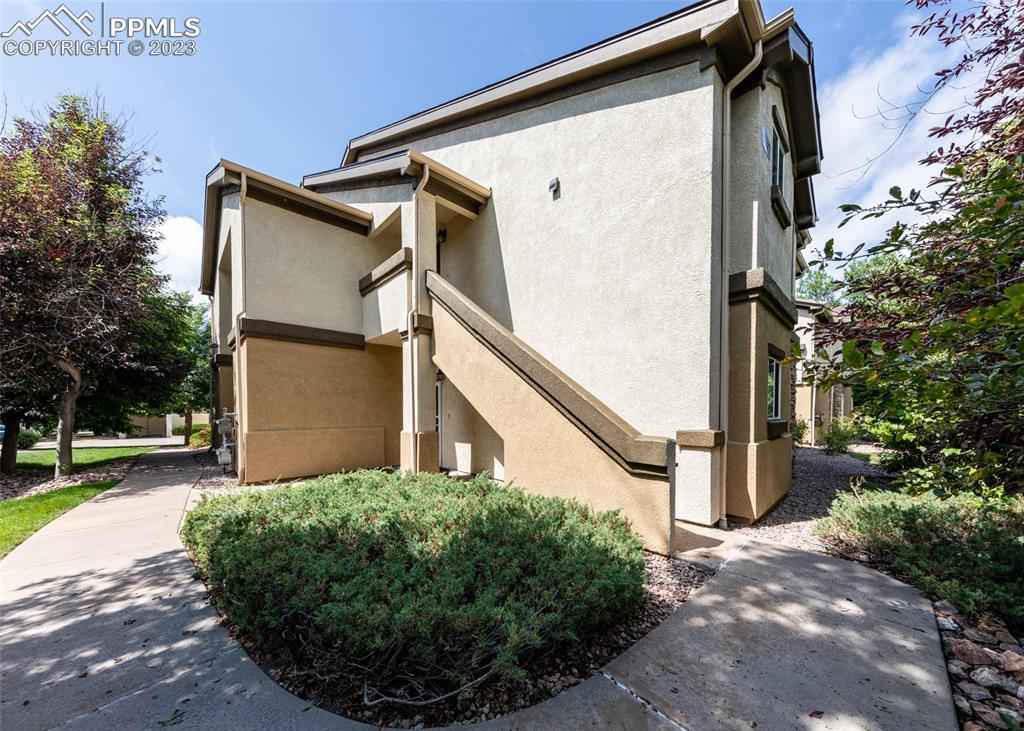 a view of a back yard of the house
