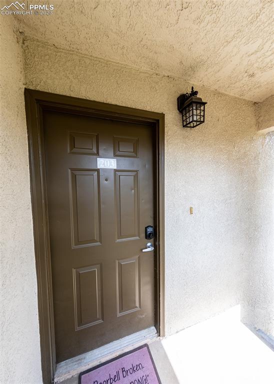 3847 Riviera Grove, Unit 203 Colorado Springs, CO 80922 - Photo 4 of 32 a bathroom with a shower