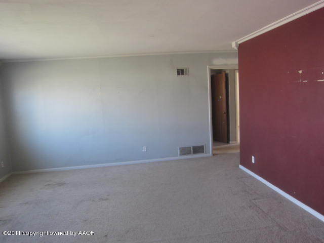 4304 South Ong Street Amarillo, TX 79110 - Photo 3 of 5 a view of an empty room